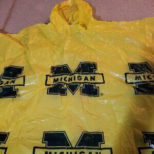 New, never worn maize Michigan Wolverines rain poncho  with hood. OS.